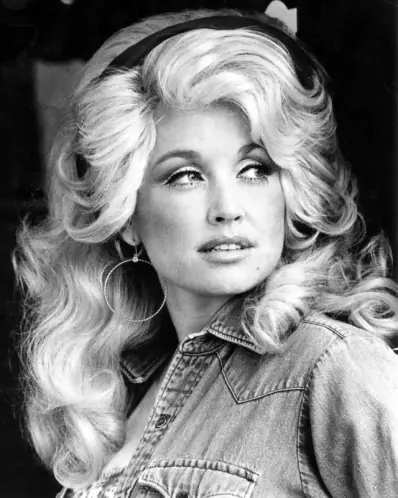 Added 2026-10-26: universally loved heroes (no-repeat wall)

## Dolly Parton