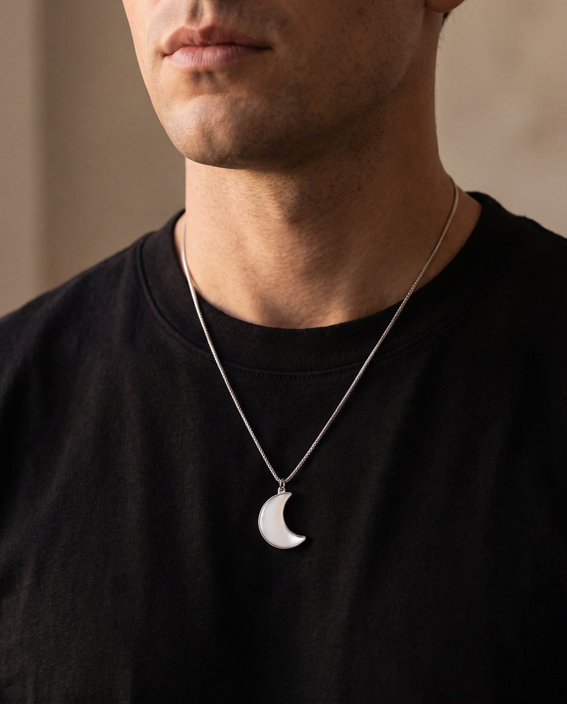 Worn on a black tee